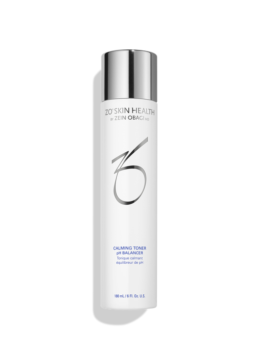 A 180ml bottle of ZO Skin Health Calming Toner pH Balancer. Tall white cylinder with a shiny silver cap and metallic ZO logo on a black background.