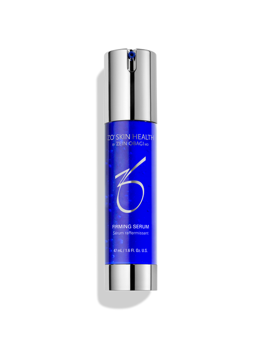 A 47ml bottle of ZO Skin Health Firming Serum with a sleek blue body and silver metallic accents, shown against a black background.